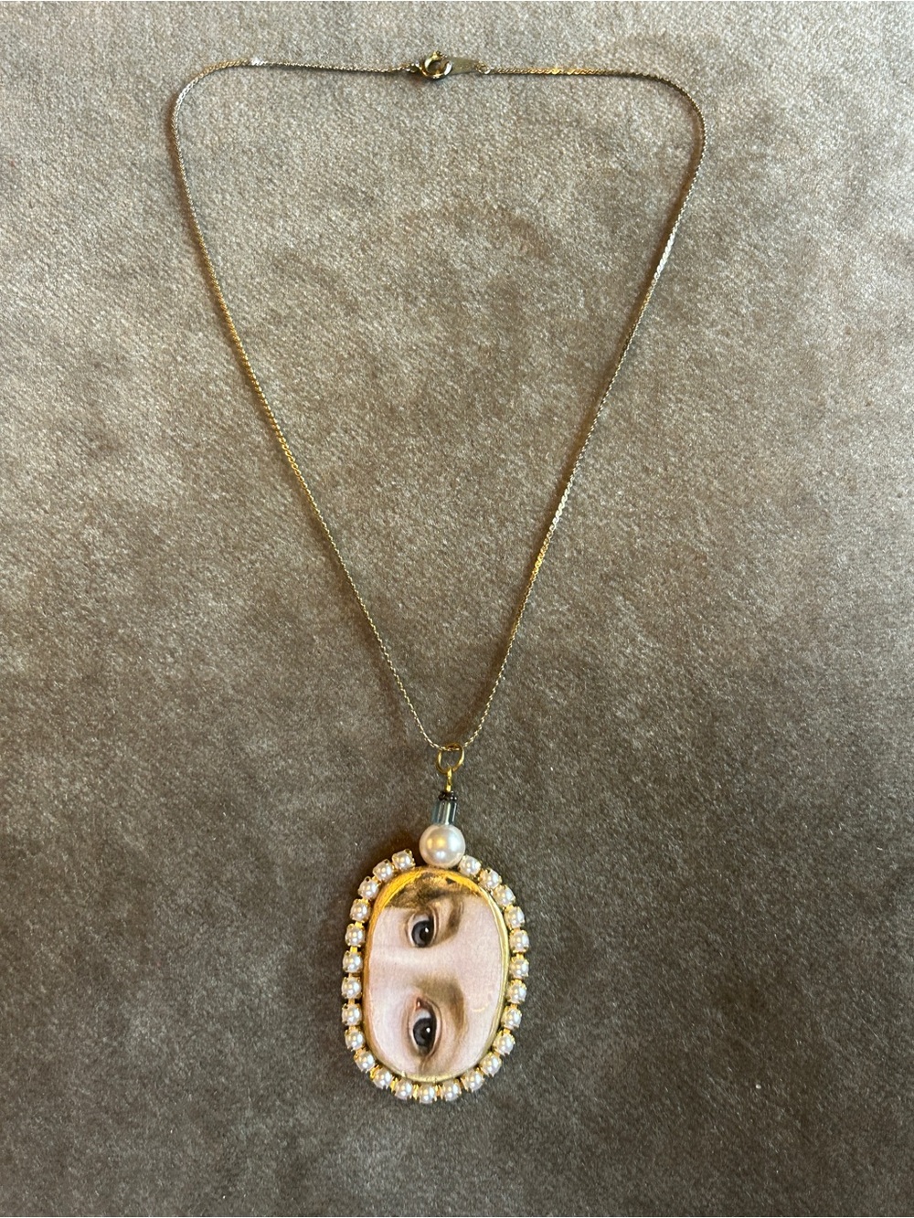 Gold-Tone Lover’s Eye Portrait Pendant Necklace with Pearl Accent